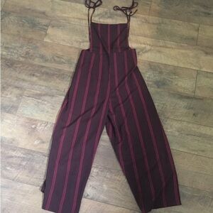 Burgundy and red striped jumpsuit with tie back and side slits